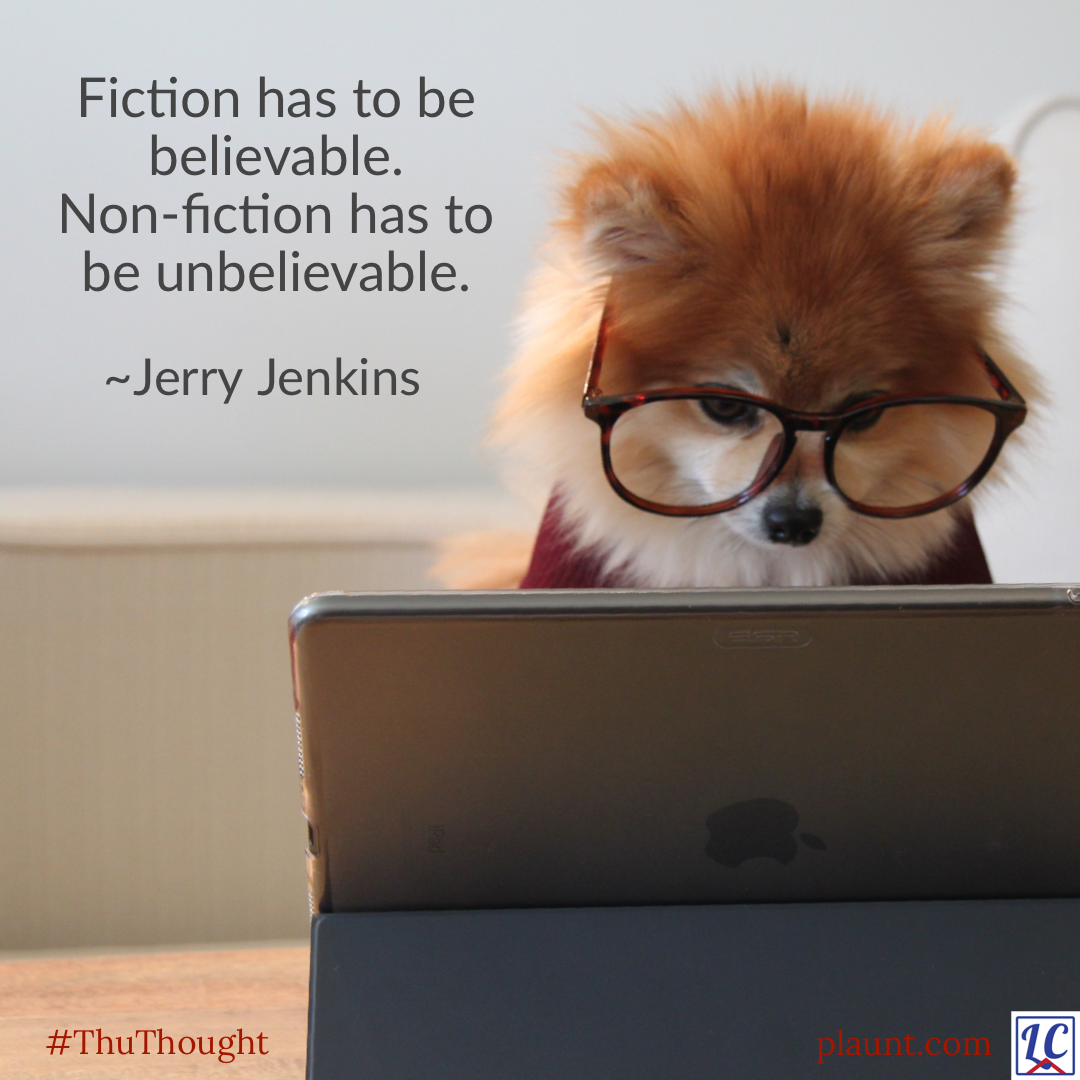 A ginger and white Pomeranian wearing red glasses looking at an iPad on a stand. Caption: Fiction has to be believable. Non-fiction has to be unbelievable. ~Jerry Jenkins