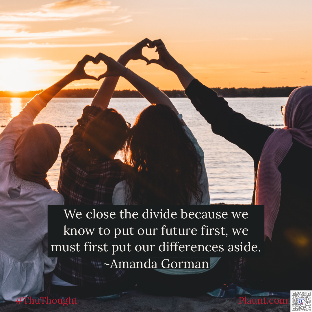 Four women are sitting on a beach looking out at the lake at sunset. Each is holding up a hand with a partner to form hearts that are silhouetted against the golden sky. Caption: We close the divide because we know to put our future first, we must first put our differences aside. ~Amanda Gorman