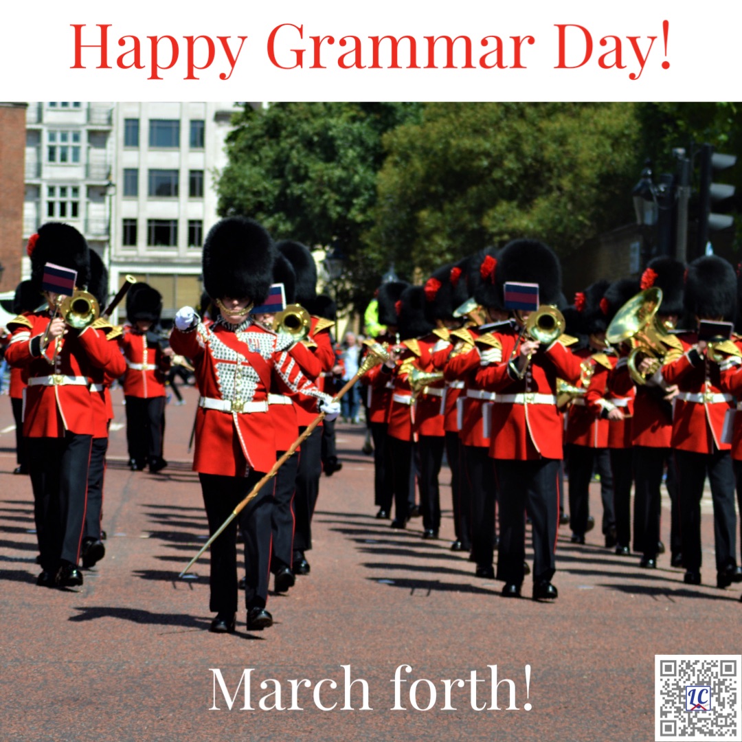 A band wearing red coats and bearskin hats marching down the street playing brass instruments. Caption: Happy Grammar Day! March forth!